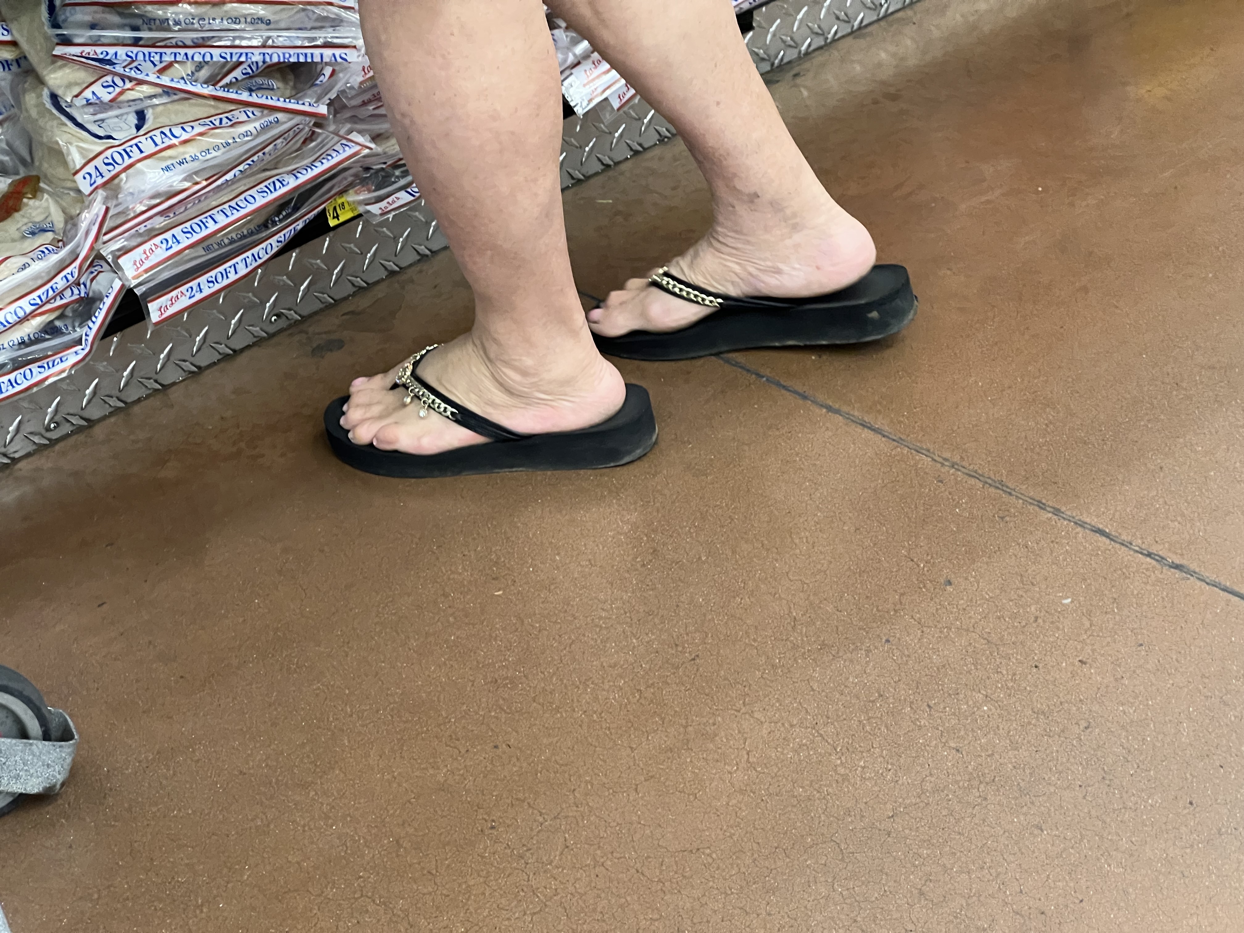 Gilf and milf feet at supermarket — 11